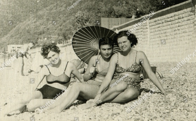 stock-photo-russia-circa-s-vintage-photo-shows-soviet-girls-resting-on-the-beach-231270145.jpg